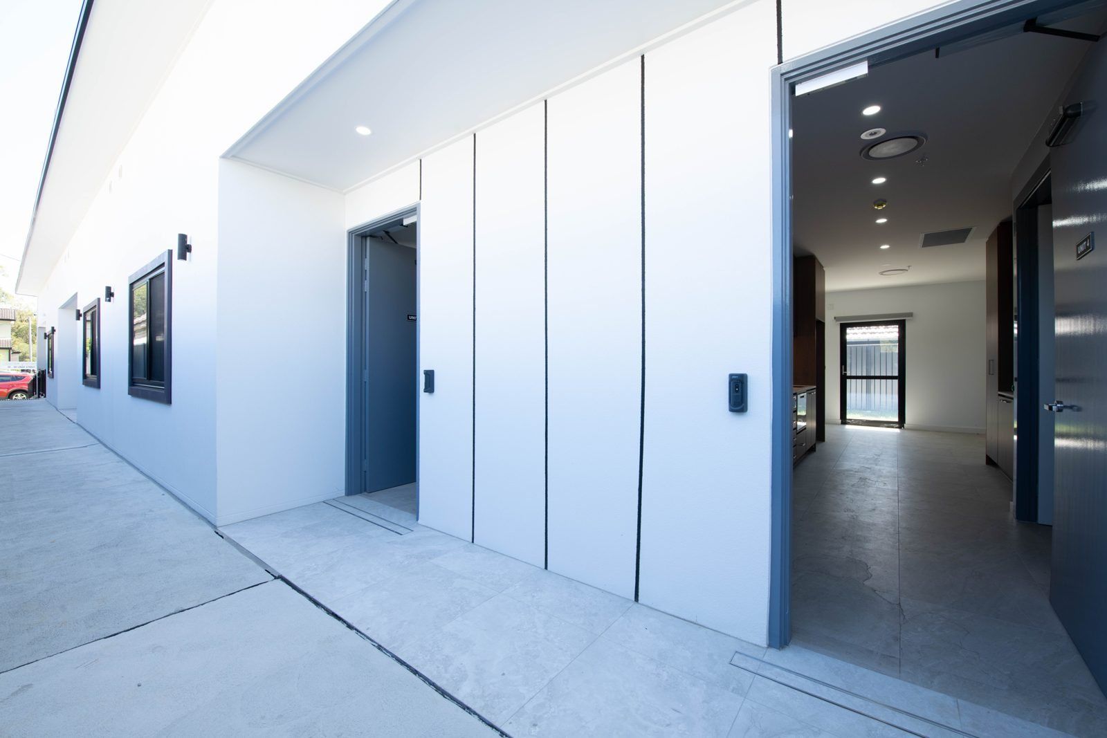 Photo 10 of 11: Covered walkway along the villa entrances